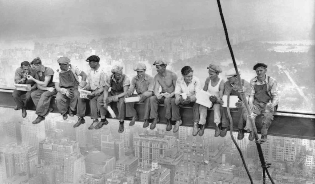 lunch atop a skyscraper - steelworkers eating lunch above New York City