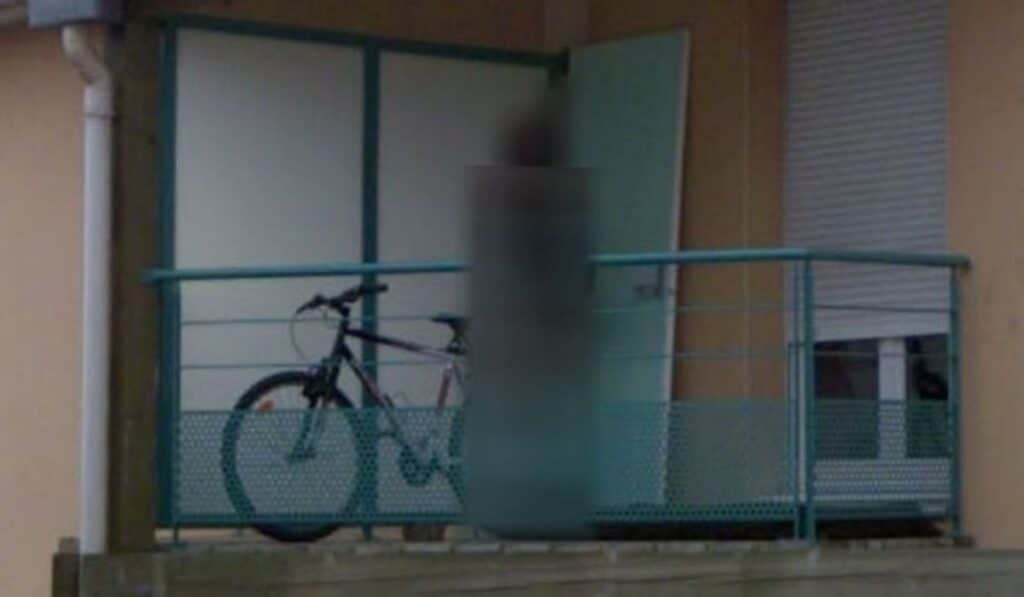 Ghost on the balcony in Nancy, France - creepiest place on Google Earth